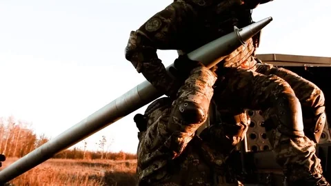 Mobility Artillery Rocket System. Soldiers load shells Stock Footage 121795800