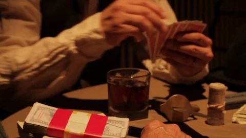 Mobster hands gambling and playing cards, drinking, smoking in 1920s/1930s Vidéo 106947779