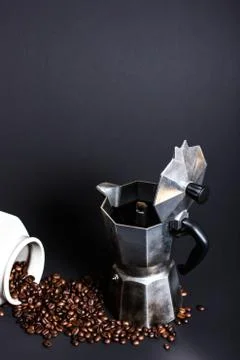 Mocha coffee maker with fresh made black coffee and coffee beans 스톡 사진