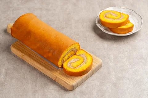 Mocha roll cake Stock Photos