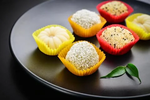 Mochi assortment on plate with chopticks Stock Photos