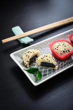 Mochi assortment on plate with chopticks Stock Photos
