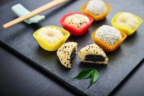 Mochi assortment on slate tray Stock Photos