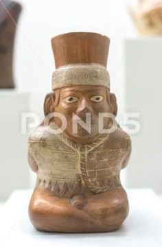 Mochica vessel in the form of a seated prisoner Stock Photos