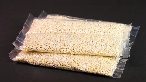 Mochimugi in small bags, rotating Stock Footage 307740802