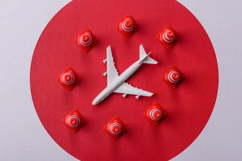 A mock up of airplane surrounded by no fly signs on a japanese flag Stock Photos