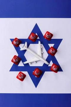 A mock up of airplane surrounded by no fly signs on a Israeli flag as a bac.. Stock Photos