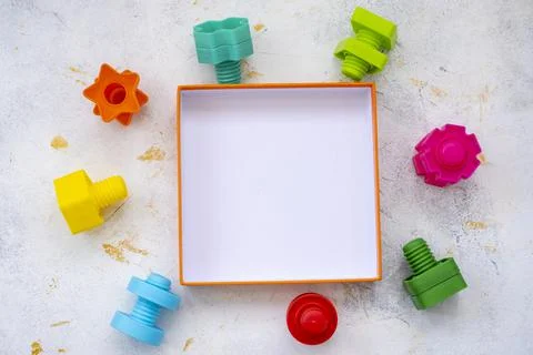 Mock up background educational constructor for children, nuts and bolts in the Stock Photos