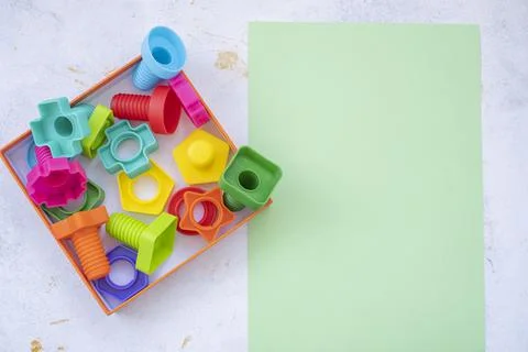 Mock up background educational constructor for children, nuts and bolts in the Stock Photos