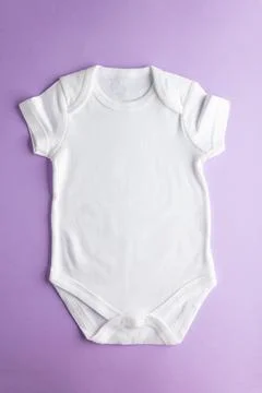 Mock-up of basic cotton clothes for babies. White bodysuit for girls and boys Stock Photos