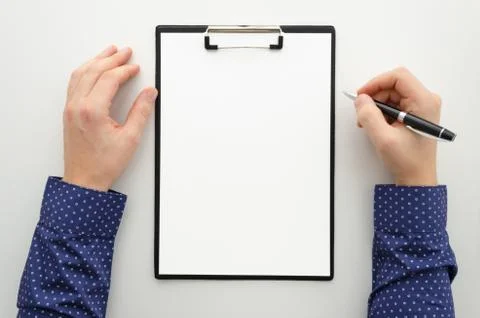 Mock up with blank clipboard with paper document, report ,man holding pen Stock Photos