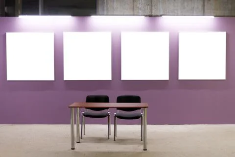 Mock up. Blank picture frames on pink wall in the loft interior. Gallery wall Stock Photos