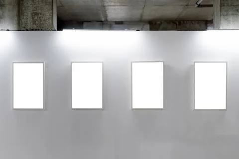 Mock up. Blank picture frames on white wall. Gallery wall with empty frames i Stock Photos