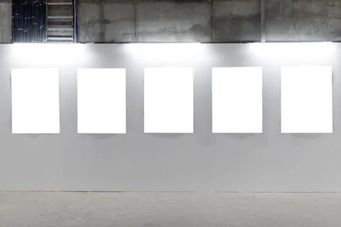 Mock up. Blank picture frames on white wall. Gallery wall with empty frames i Stock Photos