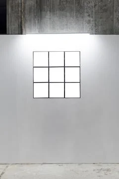 Mock up. Blank picture frames on white wall. Gallery wall with empty frames i Stock Photos