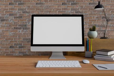 Mock up computer pc on table with books and lamp. Stock Photos