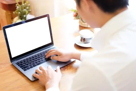 Mock up Copy Space Blank Screen workspace with computer laptop on table. Stock Photos