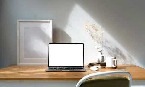 Mock up Copy Space Blank Screen workspace with computer laptop on table.. Stock Photos