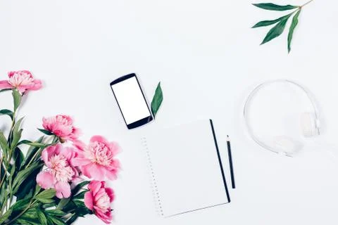 Mock-up of desktop with empty notepad, blank smart phone Stock Photos