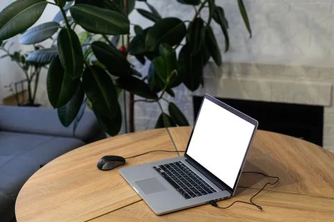 Mock up digital tablet with wireless keyboard on wooden table. Stock Photos