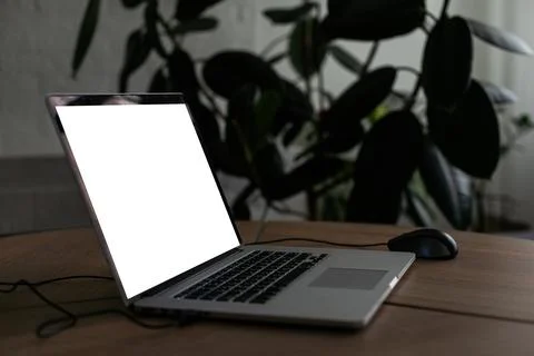 Mock up digital tablet with wireless keyboard on wooden table. Stock Photos