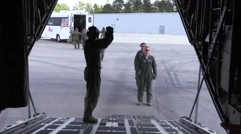 Mock drill-Hercules C-130: Loadmaster Clears for Wounded to be Brought Onboard Stock Footage 56647764