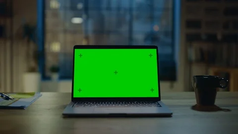 Mock-up Green Screen Laptop Standing on the Desk in the Modern Creative Office. Stock Footage 111333834