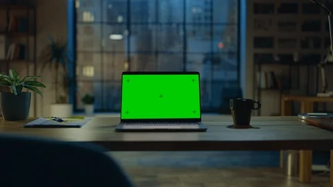 Mock-up Green Screen Laptop Standing on the Desk in the Modern Creative Office. Stock Footage 111333956
