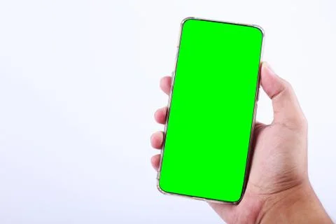 Mock up image of casual man using blank screen mobile smart phone on white backg Stock Photos