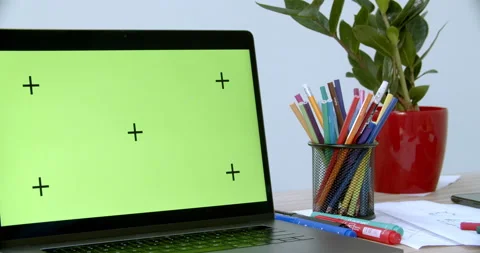 Mock-up laptop computer with chroma key green screen set on working space Stock Footage 170635569