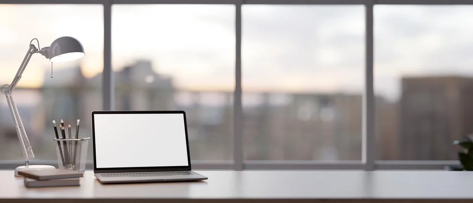 Mock up laptop computer on a table in minimal modern living room. Home work.. Stock Illustration