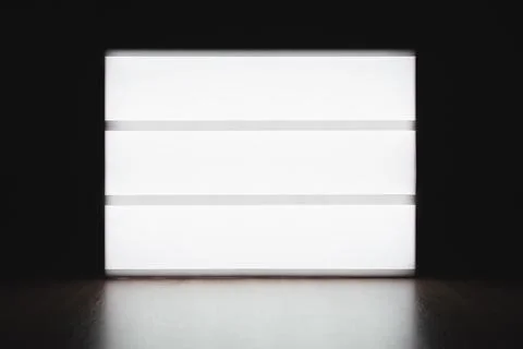 Mock up lightbox luminous display without letters on the table in the dark Stock Photos