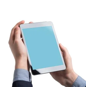 Mock up of a man holding digital tablet device Fotos de archivo