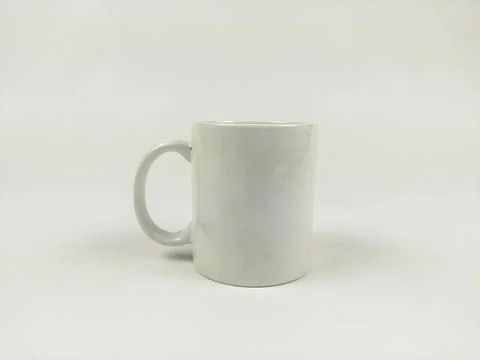 Mock up mug. Template of a white mug on the white background Stock Photos