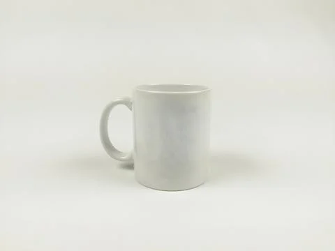 Mock up mug. Template of a white mug on the white background Stock Photos