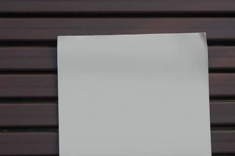 Mock-up newspaper on the bench. Stock Photos