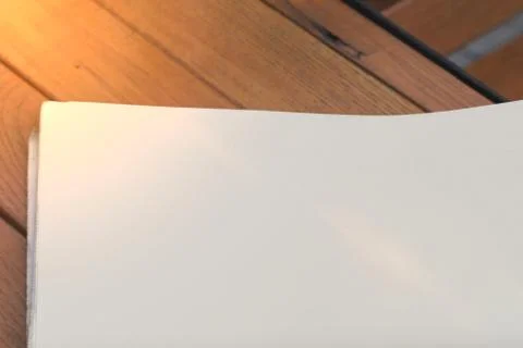 Mock Up of the newspaper on a wood background Stock Photos