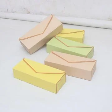 Mock Up Packaging Box Paper on Three Different Color Stock Photos