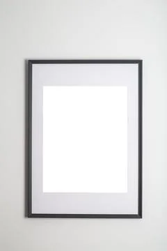 Mock up poster frame in interior white wall. White frame for poster or photo Foto stock