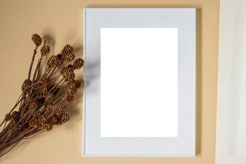 Mock up poster. Minimal template with empty picture frame mock up. Brown back Stock Photos