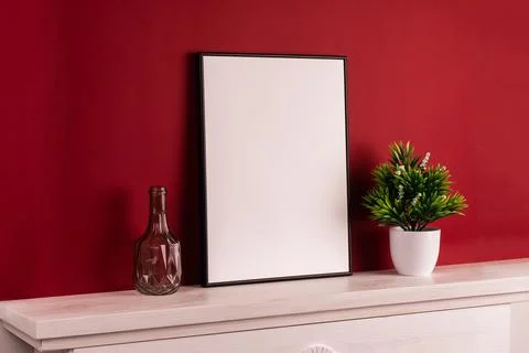 Mock up poster. Minimal template with empty picture frame mock up. Red backgr Stock Photos