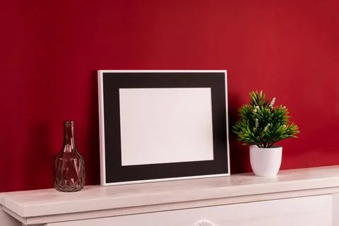 Mock up poster. Minimal template with empty picture frame mock up. Red backgr Stock Photos