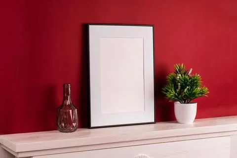 Mock up poster. Minimal template with empty picture frame mock up. Red backgr Stock Photos