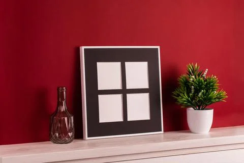 Mock up poster. Minimal template with empty picture frame mock up. Red backgr Stock Photos