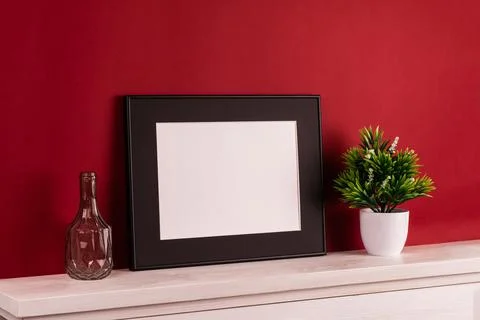 Mock up poster. Minimal template with empty picture frame mock up. Red backgr Stock Photos
