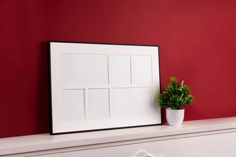 Mock up poster. Minimal template with empty picture frame mock up. Red backgr Stock Photos