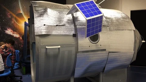 Mock spacecraft with solar panels in the classroom for children to learn Stock Footage 71205426