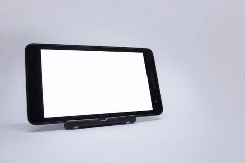 Mock up tablet with white display on a light background. Stock Photos