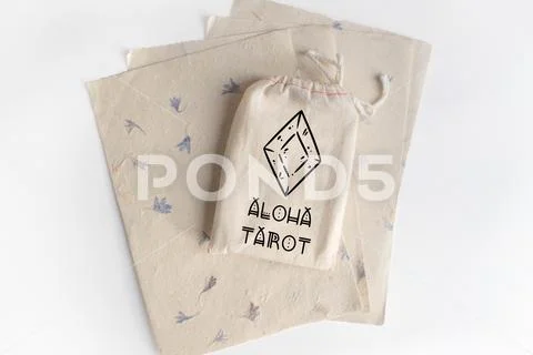 Mock up of tarot deck cotton bag with texture paper sheets on white background PSD Template