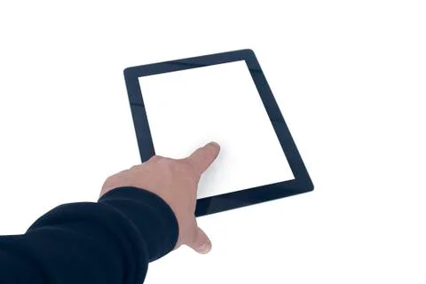 Mock-up technology . The guy is holding a tablet with a white screen on a light Stock Photos